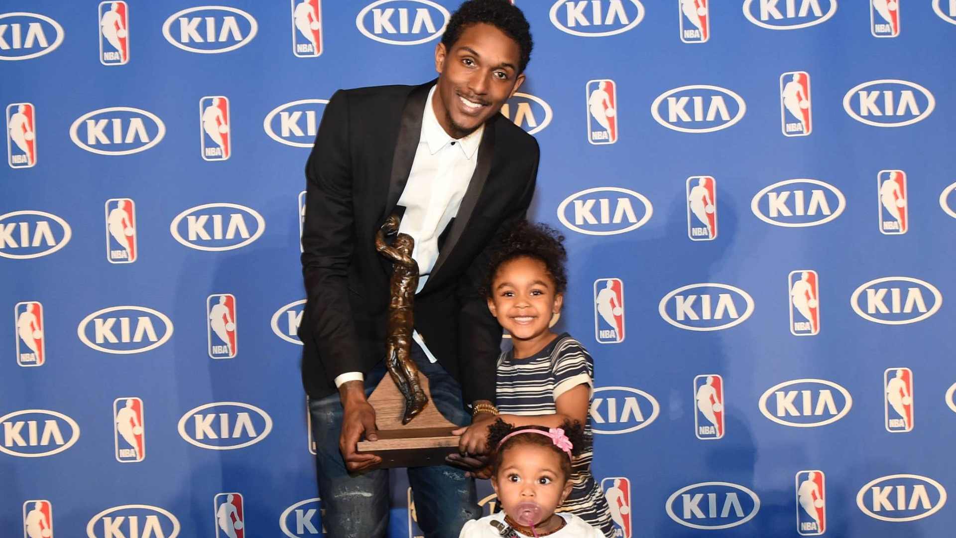 Lou Williams with his daughters, Image credit: Facebook