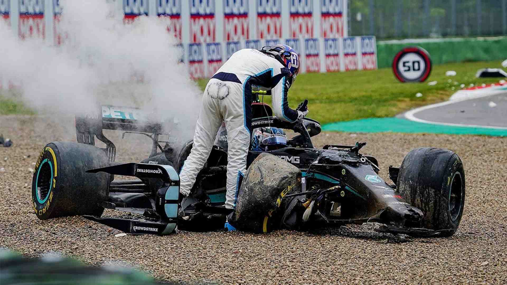 George Russell (in white) argues with Valtteri Bottas after they crashed at Imola. (Image: Twitter)